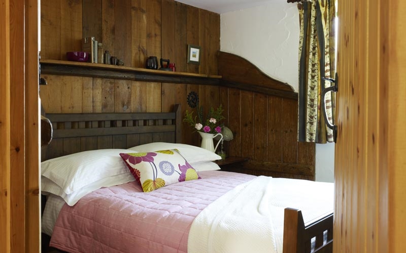 Trespaddick Cottage bedroom at Treworgie Barton Cottages